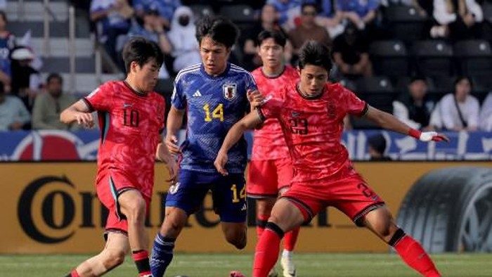 Korea Selatan kalahkan Jepang 1-0 (Foto: AFP/KARIM JAAFAR)